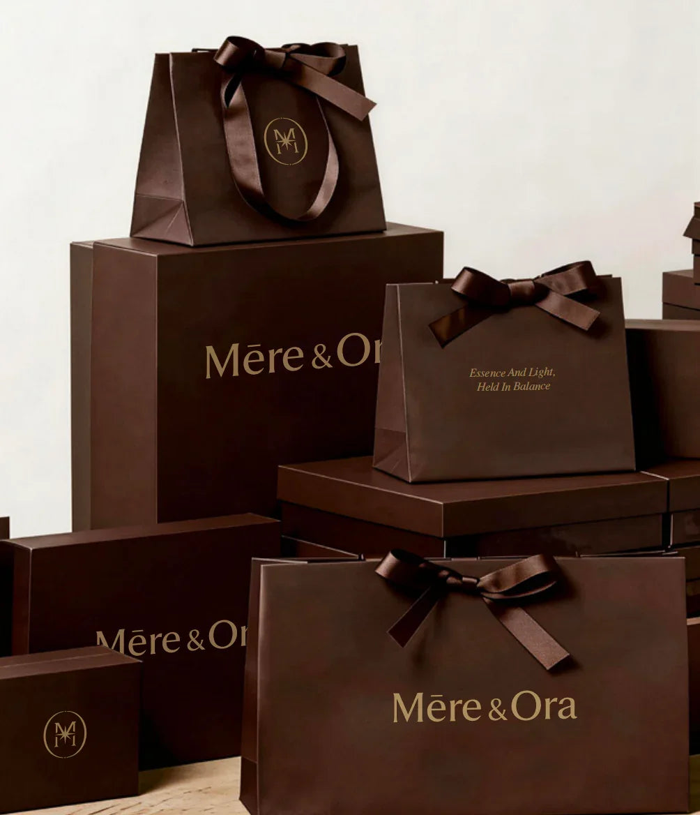Elegant dark brown jewelry packaging boxes and bags of mereora jewelry brand