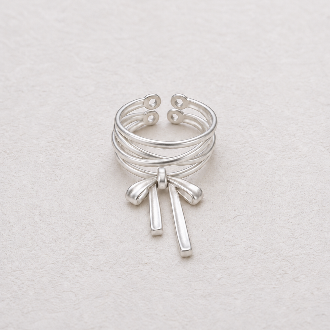 KNOTTED SIGNAL sculptural sterling silver bow ring
