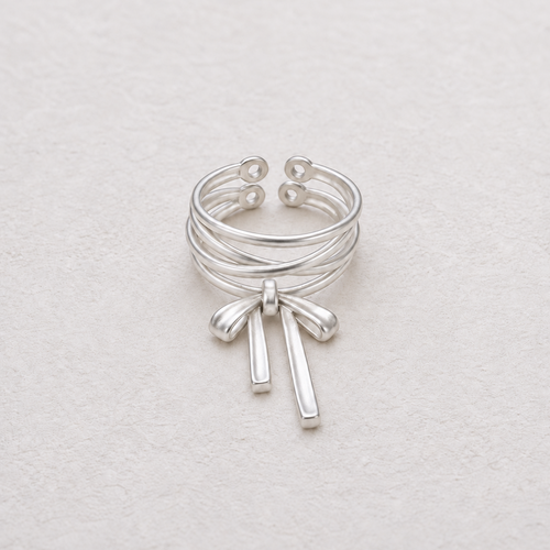 KNOTTED SIGNAL sculptural sterling silver bow ring