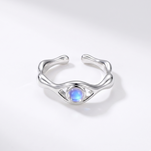Silver ring with moonstone on a white background